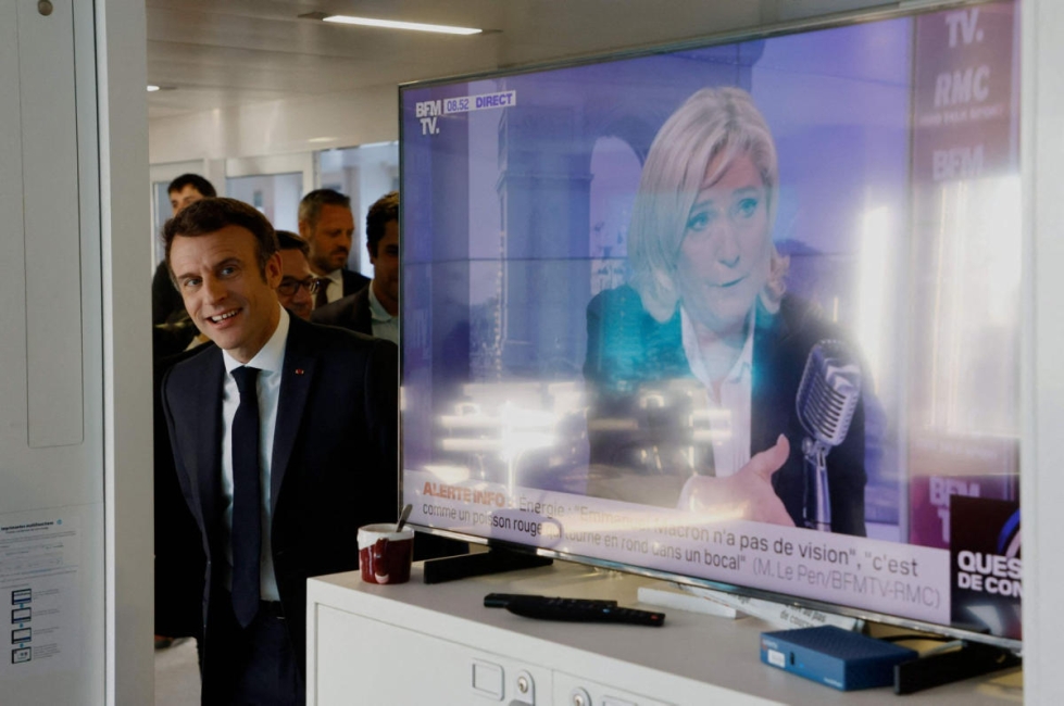 Ennusteiden mukaan taisto presidentin paikasta käydään istuvan presidentin Emmanuel Macronin ja äärioikeistolaisen Marine Le Penin välillä. LEHTIKUVA/AFP