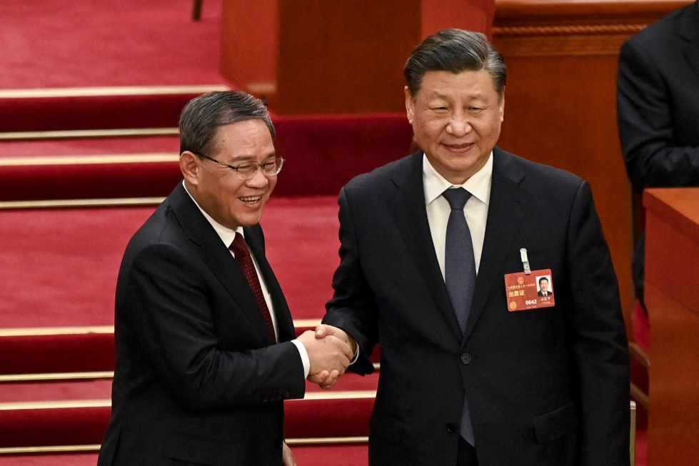 Kiinan pääministeriksi nimitetty Li Qiang (vas.) on presidentti Xi Jinpingin (oik.) liittolainen ja suosikki. LEHTIKUVA/AFP