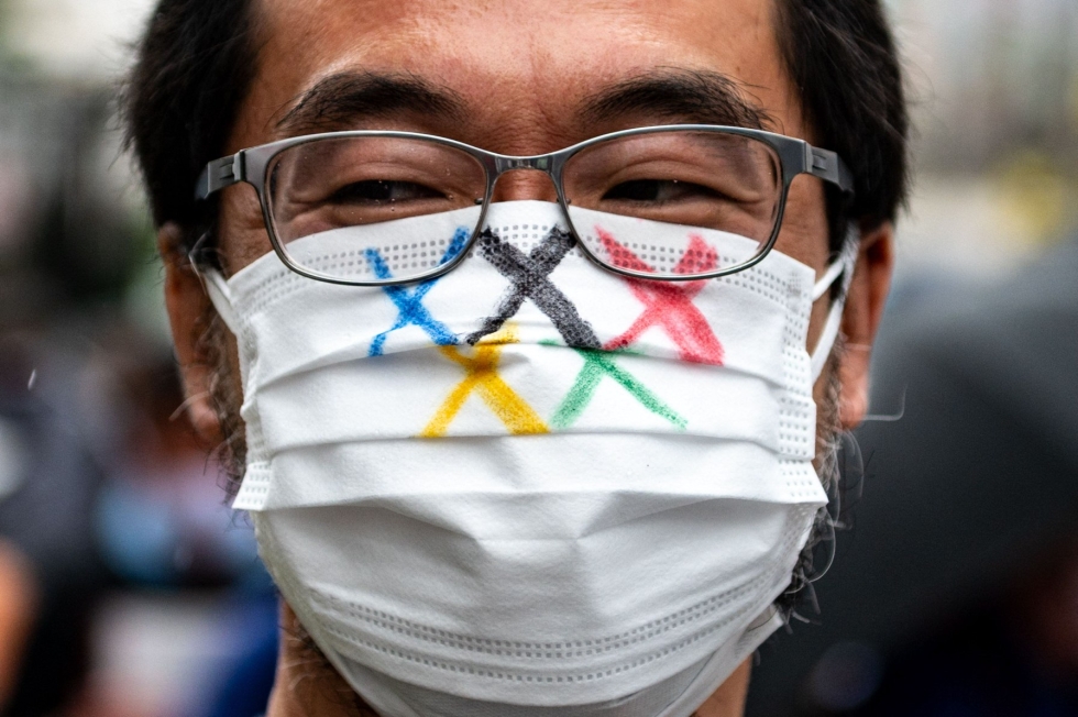 Maanantaina on määrä linjata, pääsevätkö japanilaiset katsojat olympialaisten lehtereille.  LEHTIKUVA/AFP 
