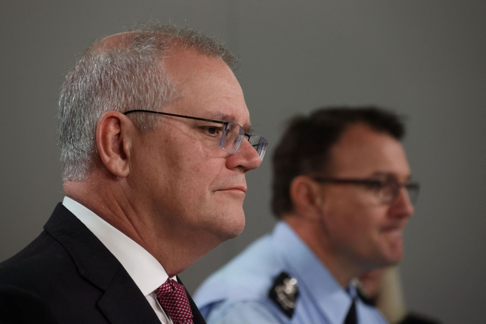 Australiassa tehtiin viime yönä luvilla satoja etsintöjä. Australian pääministeri Scott Morrison julkisti asian lehdistötilaisuudessa maanantaina. LEHTIKUVA / AFP