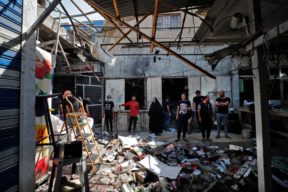 Pommi-isku tapahtui vilkkaalla torilla tiheästi asutulla Sadr Cityn esikaupunkialueella. LEHTIKUVA / AFP 