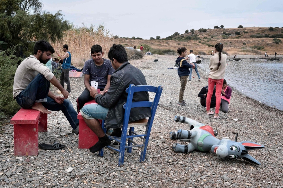 Siirtolaisia Lesboksen saaren rannalla syyskuussa 2016. LEHTIKUVA/AFP