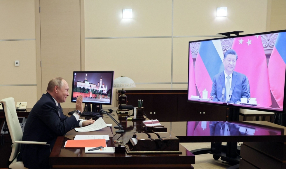 Venäjän ja Kiinan presidentit Vladimir Putin ja Xi Jinping keskustelivat videoyhteyden välityksellä. LEHTIKUVA/AFP