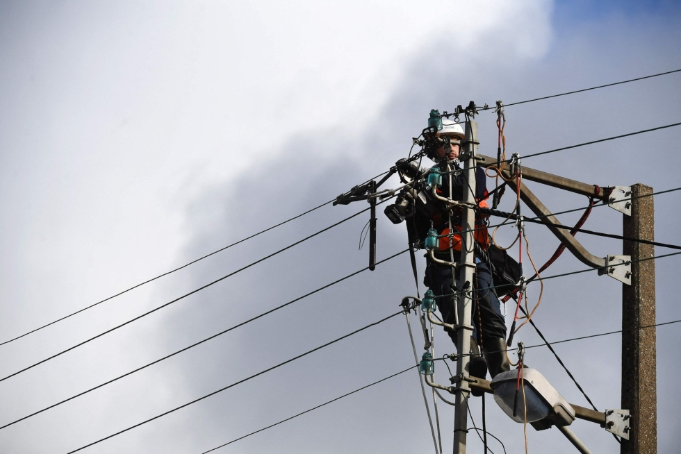 Keskeinen syy kuluttajahintojen roimaan nousuun on sähkön ja kaasun kallistuminen. LEHTIKUVA / AFP