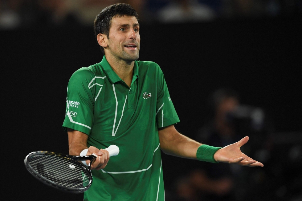 Serbian Novak Djokovic on saanut oikeuskäsittelyssä luvan pelata ensi viikolla alkavassa Australian avoimessa tennisturnauksessa. LEHTIKUVA/AFP