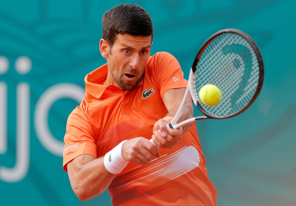 Djokovic pääsee tavoittelemaan Lontoossa seitsemättä Wimbledon-mestaruuttaan.  LEHTIKUVA / AFP