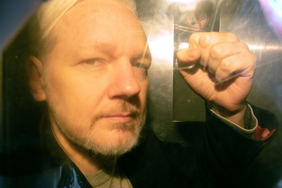 Yhdysvaltojen oikeusviranomaiset haluavat Assangen oikeuteen lukuisista syytteistä, jotka koskevat Wikileaksin vuonna 2010 julkaisemia salaisiksi luokiteltuja asiakirjoja. LEHTIKUVA/AFP