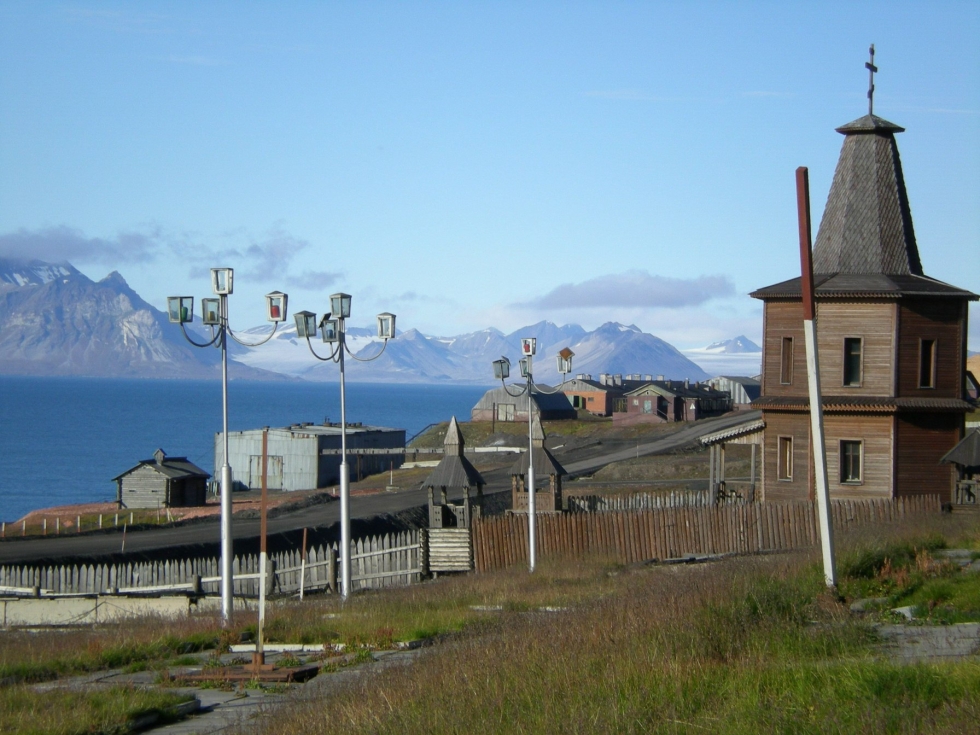 Venäläiset ja ukrainalaiset hiilikaivosmiehet ovat työskennelleet rinnakkain vuosikymmeniä Barentsburgissa. LEHTIKUVA/AFP