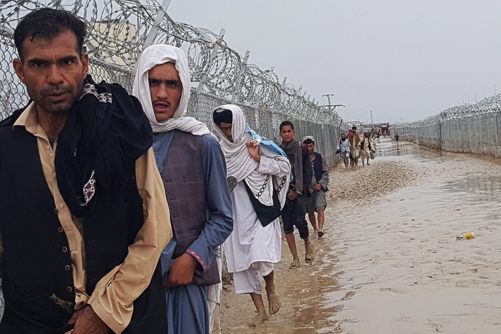 Pakistanin hallitus on julistanut hätätilan suurta osaa maata kiusanneiden rankkasateiden takia. Kuva Pakistanin ja Afghanistanin rajanylityspaikalta Chamanista.  LEHTIKUVA/AFP