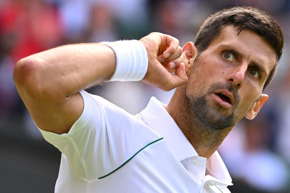 Wimbledonissa mestaruutta juhlinutta Djokovicia ei nähdä New Yorkissa. Lehtikuva/AFP