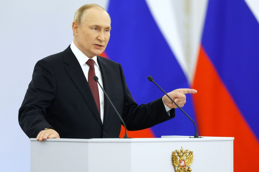 Presidentti Putin uhosi puheessaan neljän Ukrainan alueen asukkaiden olevan nyt "ikuisesti Venäjän kansalaisia". LEHTIKUVA/AFP