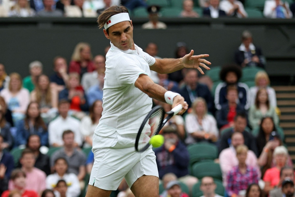 Federerin huikealta uralta muistetaan etenkin hänen mestaruutensa Wimbledonissa. Lehtikuva/AFP
