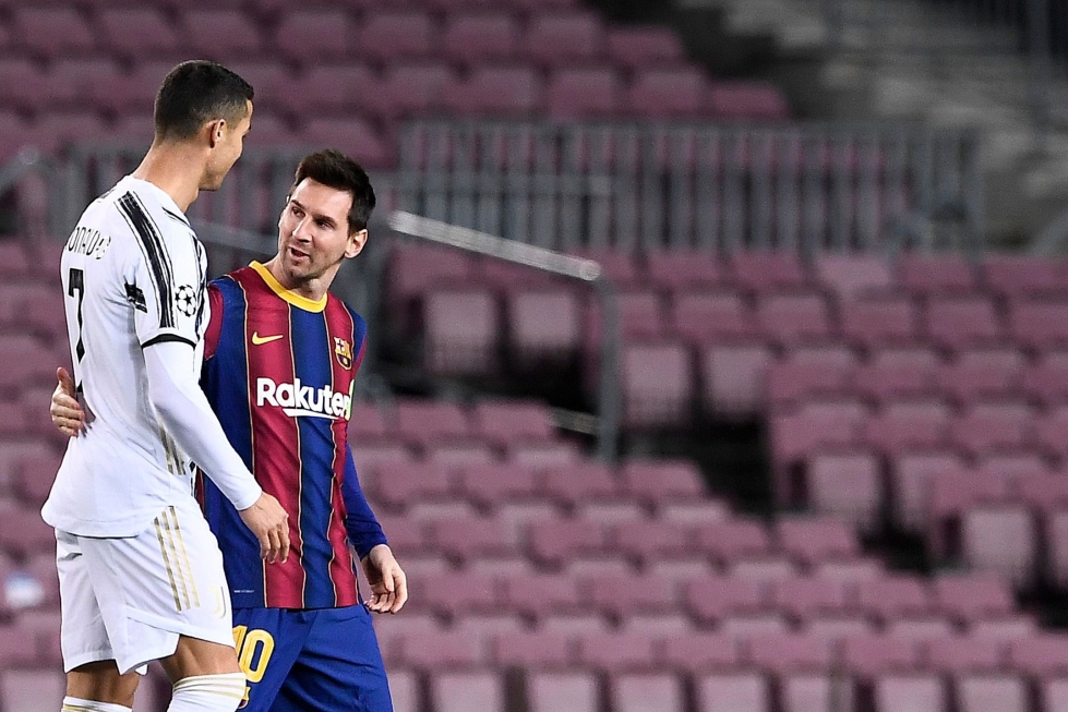 Argentiinan Lionel Messillä (oik.) ja Portugalin Cristiano Ronaldolla lienee Qatarissa viimeinen sauma voittaa MM-kulta. LEHTIKUVA/AFP