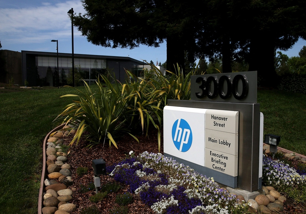 61 000 ihmistä työllistävä HP kertoo tiedotteessaan pyrkivänsä 1,4 miljardin dollarin vuosittaisiin säästöihin. LEHTIKUVA/AFP