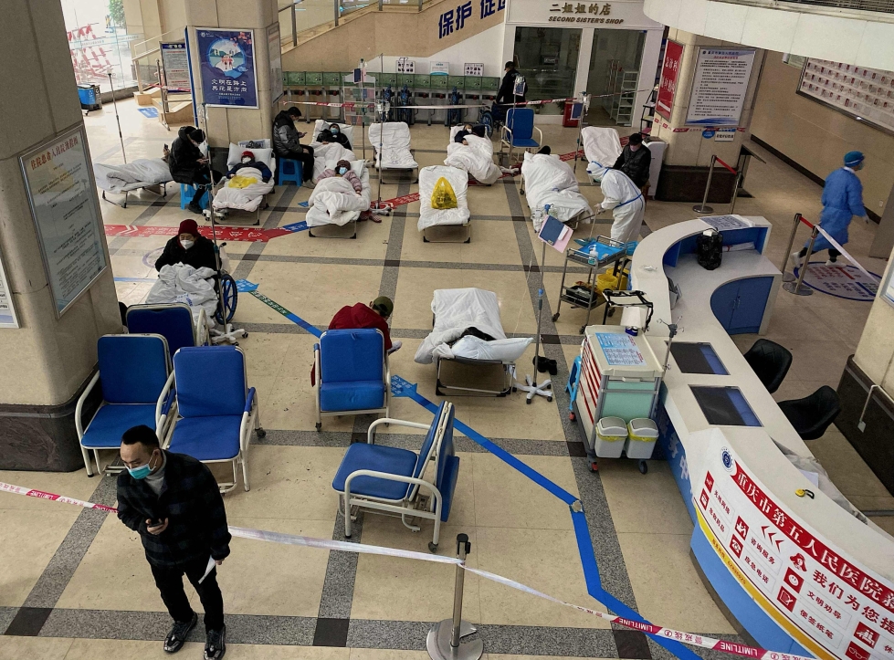 Koronatartunnat Kiinassa leviävät. Kuvaa potilaiden hoidosta Chongqingissa. Lehtikuva/AFP