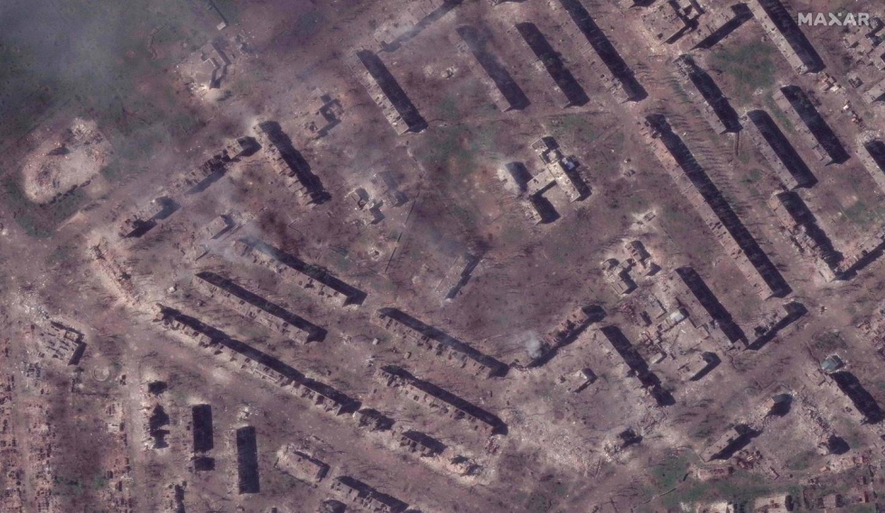 Satelliittikuvaa täysin tuhoutuneesta asuinkorttelista Bah'mutissa.