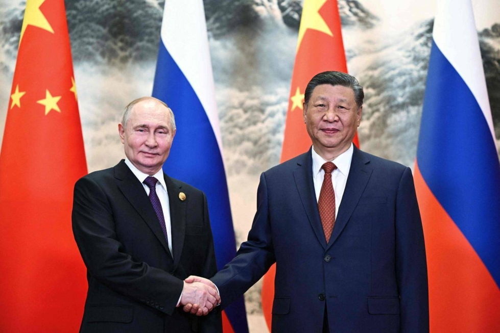 Venäjä ja Kiina syventävät sotilaallista yhteistyötään. Kuvassa vasemmalla Venäjän presidentti Vladimir Putin ja oikealla Kiinan presidentti Xi Jinping.