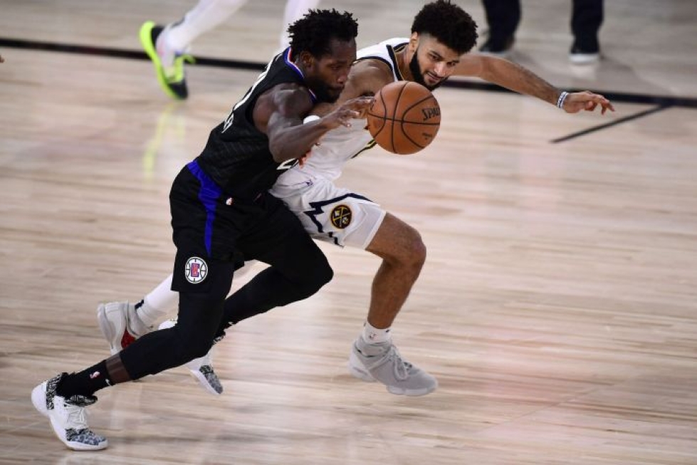 Denver Nuggets on noussut jo kahdesti kuilun partaalta ottelusarjan voittoon tämän vuoden NBA-pudotuspeleissä. LEHTIKUVA /AFP