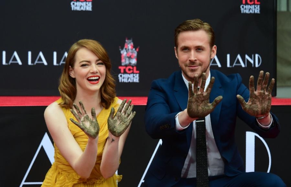 Näyttelijät Emma Stone ja Ryan Gosling ovat molemmat uutuuselokuvassa La La Land. LEHTIKUVA/AFP
