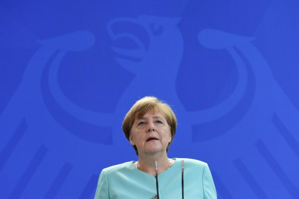 Saksan liittokansleri Merkel pahoittelee brittien päätöstä jättäytyä EU:n ulkopuolelle. LEHTIKUVA/AFP