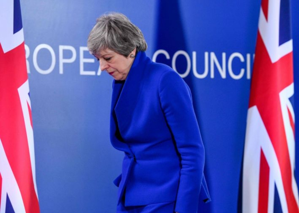 Theresa May kertoi joidenkin EU-johtajien halunneen asettaa jatkoajalle tiukkoja ehtoja, jotka hän oli kuitenkin torjunut. LEHTIKUVA/AFP