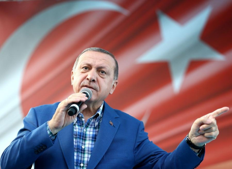 Turkin presidentti Recep Tayyip Erdogan sanoo, ettei Turkki aio sallia kurdialuetta Syyriassa etelärajallaan. LEHTIKUVA/AFP