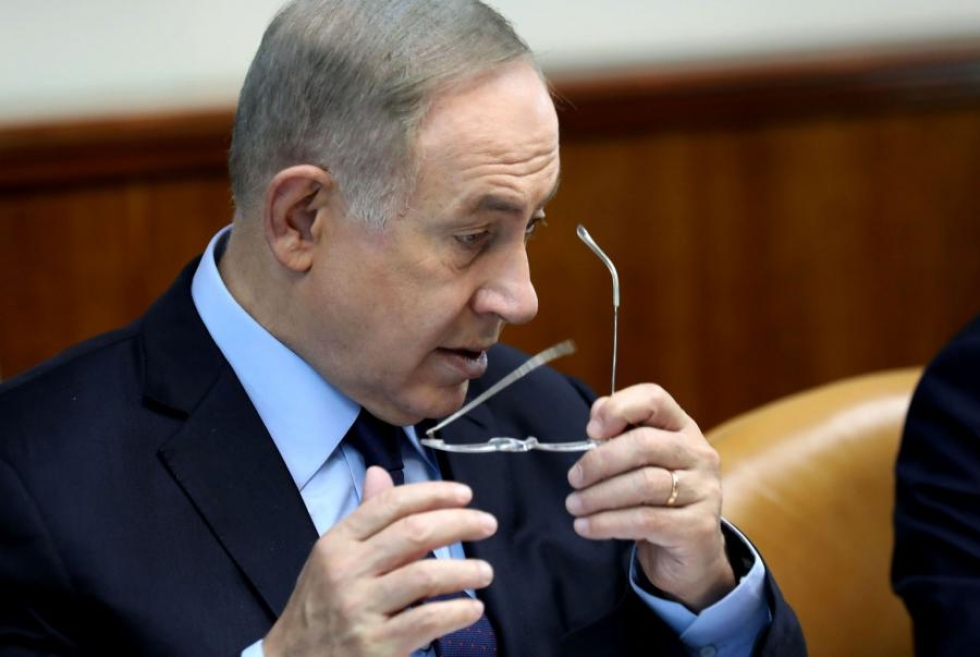 Israelin pääministeri Benjamin Netanjahu korostaa, että hänen poliittisilla vastustajillaan ei ole syytä juhlia. LEHTIKUVA/AFP