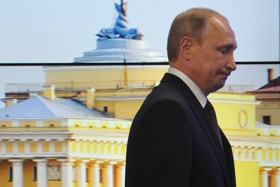 Vladimir Putin kiistää, että Venäjällä harjoitettaisiin järjestäytynyttä dopingin käyttöä. LEHTIKUVA/AFP
