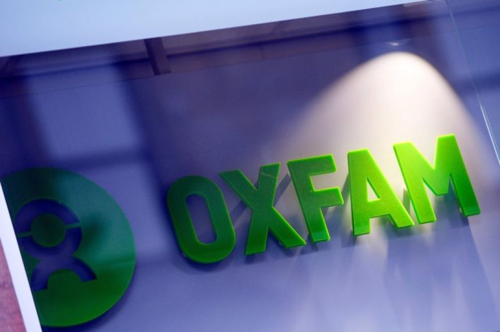Oxfam vaatii hallituksilta veronkorotuksia ja varoitti, että hallitukset pahentavat epätasa-arvoa vähentämällä julkisen sektorin rahoitusta. LEHTIKUVA/AFP