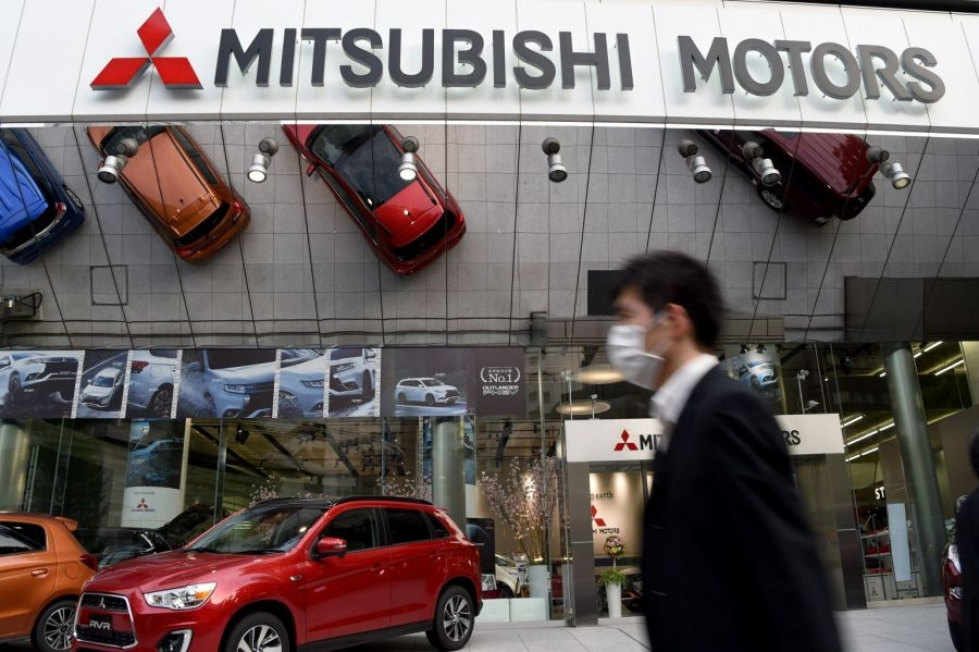 Mitsubishin pörssikurssi niiasi pahasti kulutushuijauksen paljastuttua. LEHTIKUVA/AFP