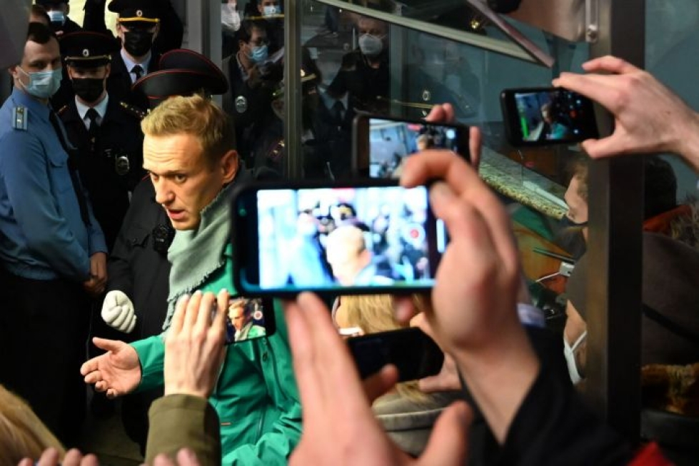 Tutkija Jussi Lassilan mukaan Aleksei Navalnyin (kuvassa) paluuta ympäröineissä tapahtumissa on pitkälti kyse arvovaltakamppailusta. LEHTIKUVA / AFP