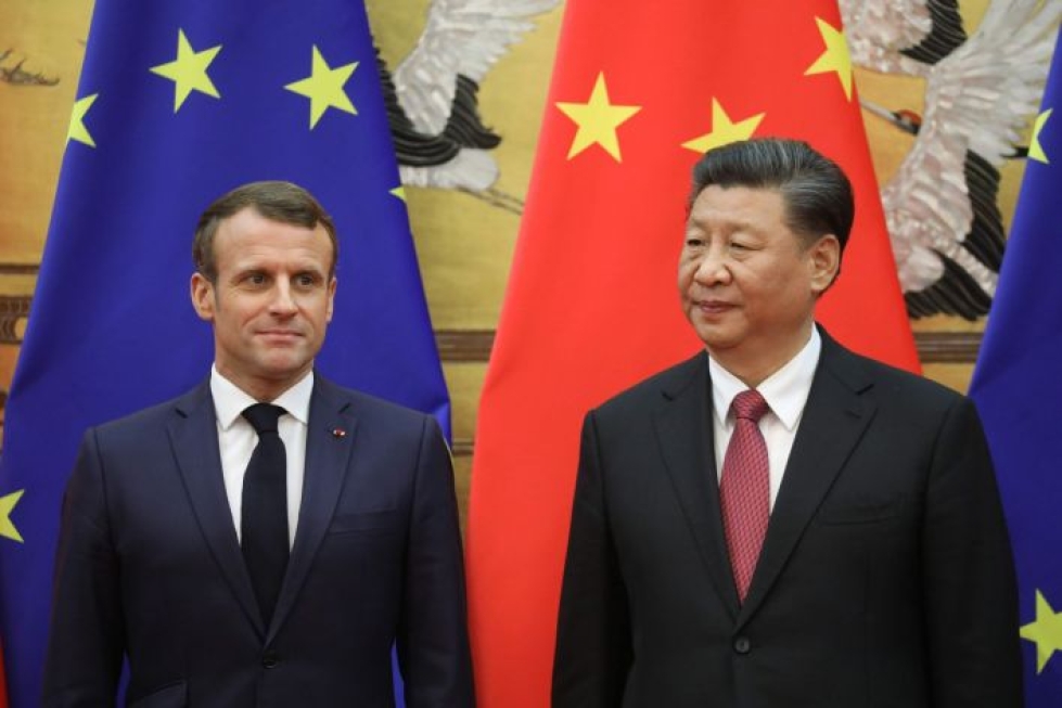 Ranskan presidentti Emmanuel Macron ja Kiinan presidentti Xi Jinping vakuuttivat tukevansa vankasti Pariisin ilmastosopimusta. LEHTIKUVA / AFP