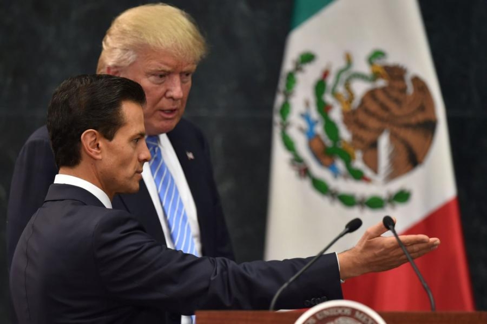 Yhdysvaltain republikaanien presidenttiehdokas Donald Trumpin ja Meksikon presidentin Enrique Pena Nieton tapaaminen oli ennen kaikkea tapa rauhoitella sijoittajia Meksikossa, uutisoi CNN lähteisiinsä vedoten. LEHTIKUVA/AFP