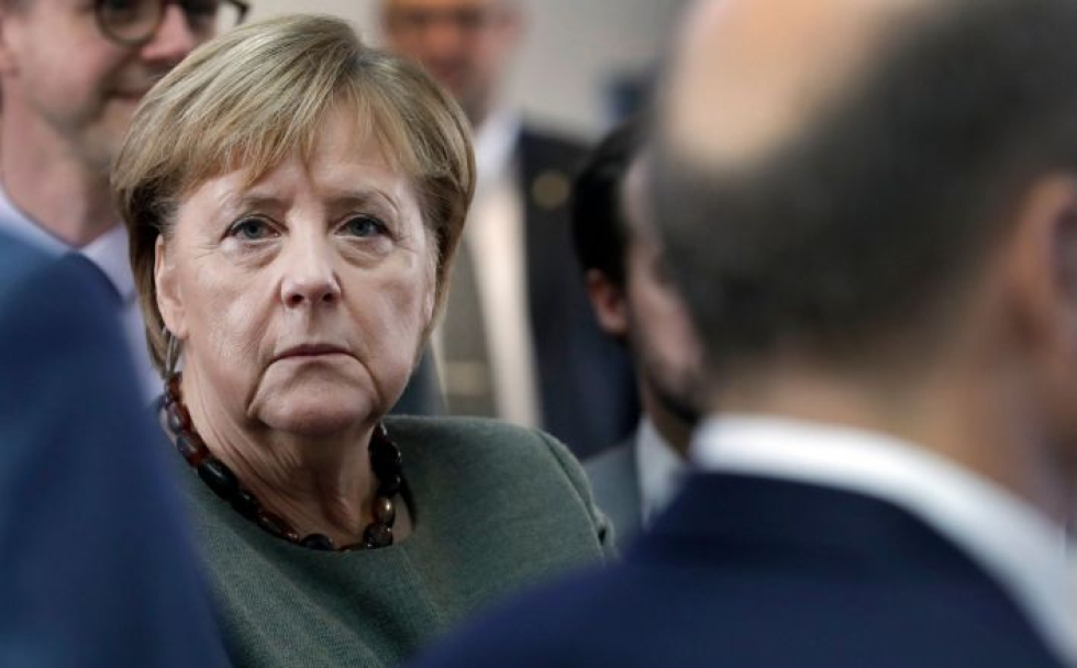 Chemnitzissä on vallinnut syksyn aikana jännittynyt tunnelma liittokansleri Angela Merkelin maahanmuuttopolitiikkaa vastustavien ja kannattavien kesken. LEHTIKUVA / AFP