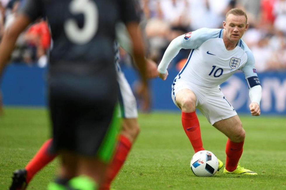 Wales, Pohjois-Irlanti ja Irlanti ovat Englannin kilpailijoita Brittein saarilta, Wayne Rooney muistuttaa. LEHTIKUVA/AFP