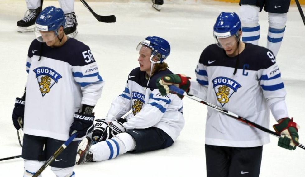 Finaalitappio otti koville. Vasemmalta Teemu Pulkkinen, Patrik Laine ja Mikko Koivu. LEHTIKUVA / Jussi Nukari
