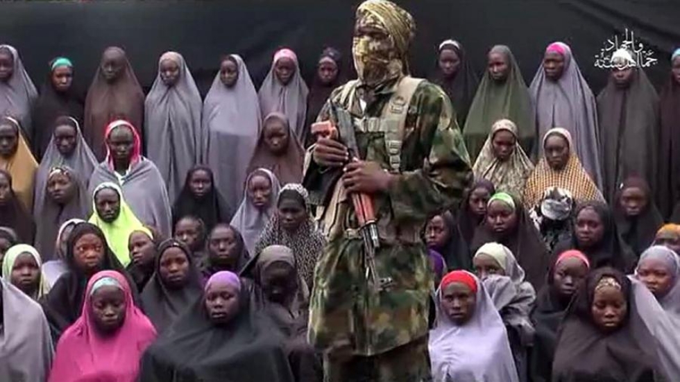 Boko Haramin videolla esiintyy järjestön väitteiden mukaan siepattuja koulutyttöjä. LEHTIKUVA/AFP