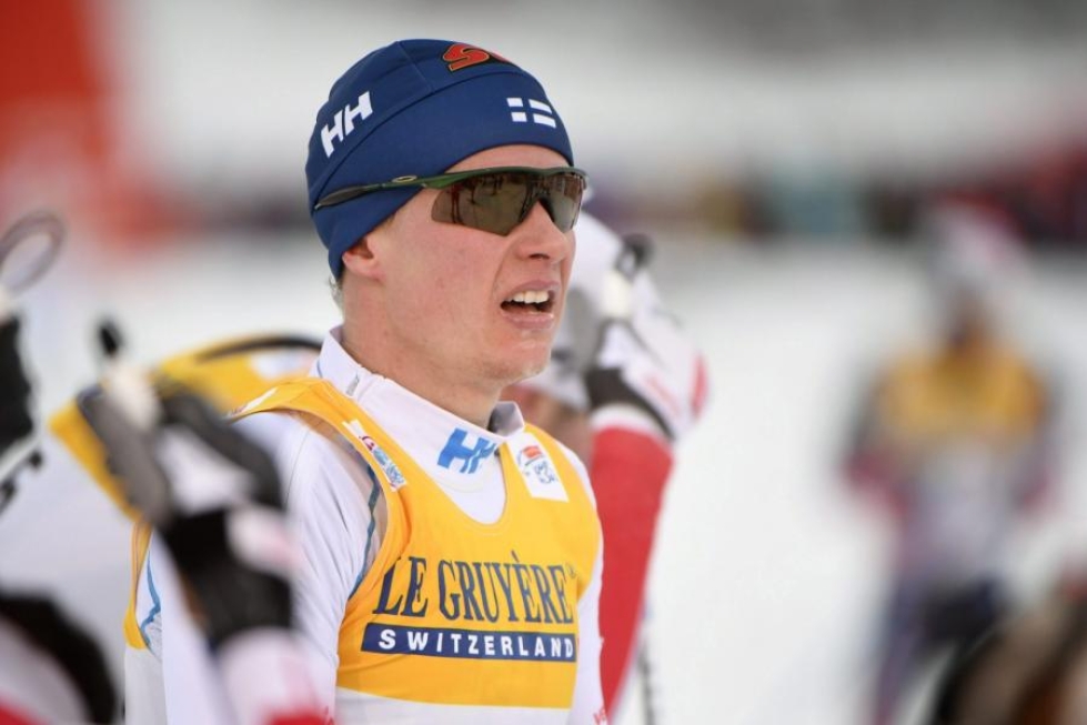 Miesten kiertueella Matti Heikkinen on 12:ntenä ennen 15 kilometrin takaa-ajohiihtoa. LEHTIKUVA/AFP
