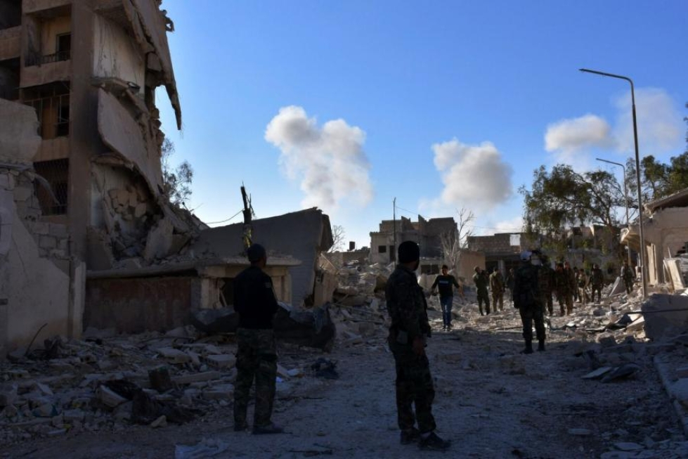 Syyriassa tuhannet siviilit ovat paenneet pommituksia Aleppon kaupungin itäosissa. LEHTIKUVA/AFP