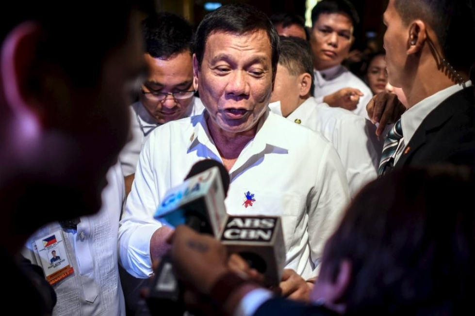 Presidentti Duterte uhkaa kiihdyttää huumekauppiaiden vastaista sotaansa. LEHTIKUVA/AFP