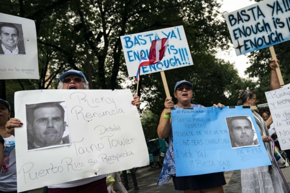 Mielenosoittajat ovat jo reilun viikon ajan vaatineet kuvernööri Ricardo Rossellon välitöntä eroa. LEHTIKUVA / AFP