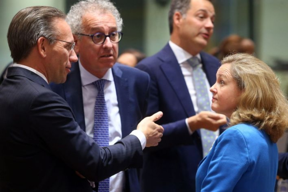 Saksan, Luxemburgin ja Espanjan valtiovarainministerit neuvottelivat Brysselissä heinäkuussa. Lehtikuva/AFP