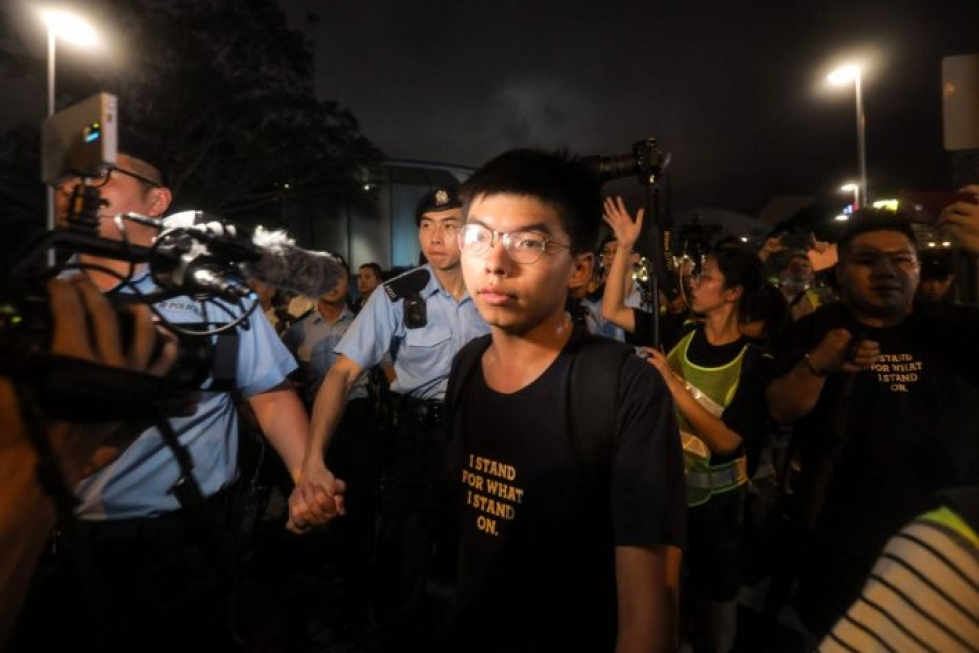Joshua Wongista tuli Hongkongin demokratialiikkeen kasvot vuonna 2014. LEHTIKUVA / AFP