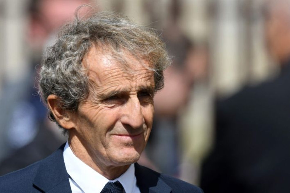Alain Prost valotti kuvioita kuljettavalinnan taustalla. Lehtikuva/AFP