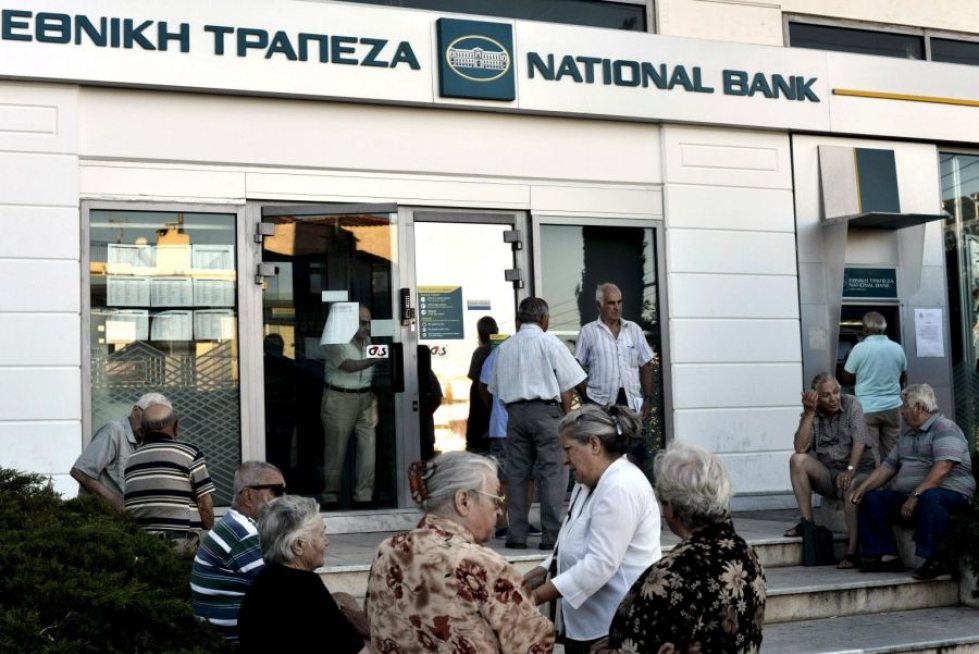 Kreikalta erääntyy heinäkuussa iso lainaerä, jonka maksusta sen ei uskota selviävän ilman apua. LEHTIKUVA/AFP