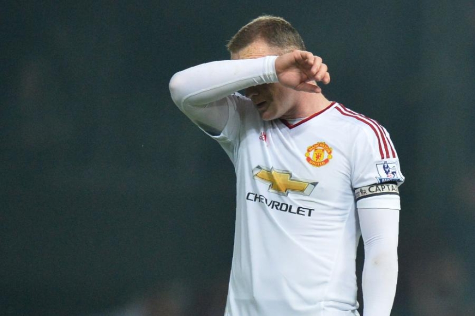 West Hamille pelin loppuminuuteilla kärsitty tappio otti koville Manchester Unitedin tähtihyökkääjälle Wayne Rooneylle. LEHTIKUVA/AFP