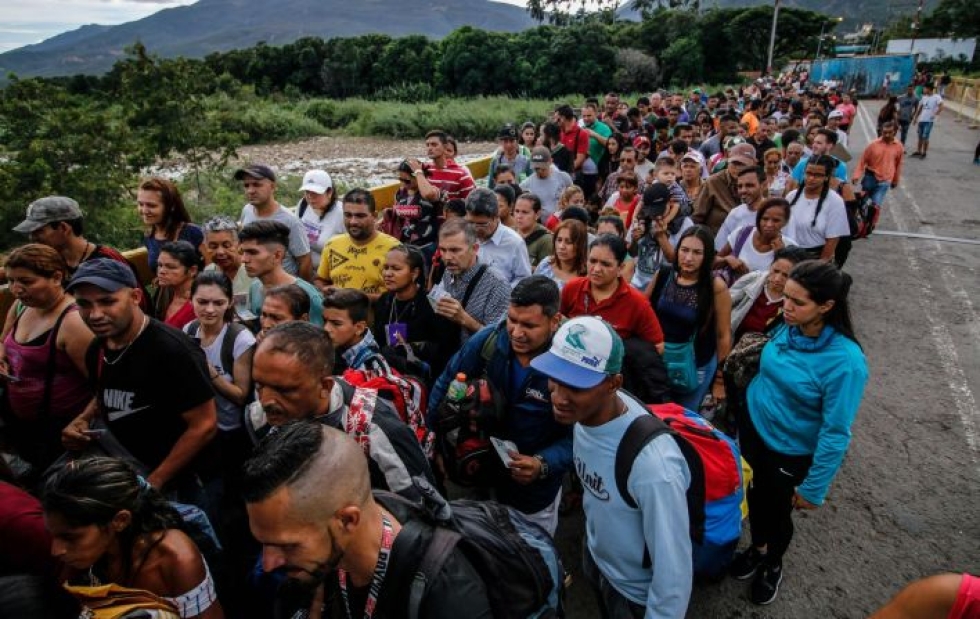 YK:n mukaan yli kolme miljoonaa ihmistä on paennut talouskriisin koettelemasta Venezuelasta viimeisen kolmen ja puolen vuoden aikana. LEHTIKUVA/AFP