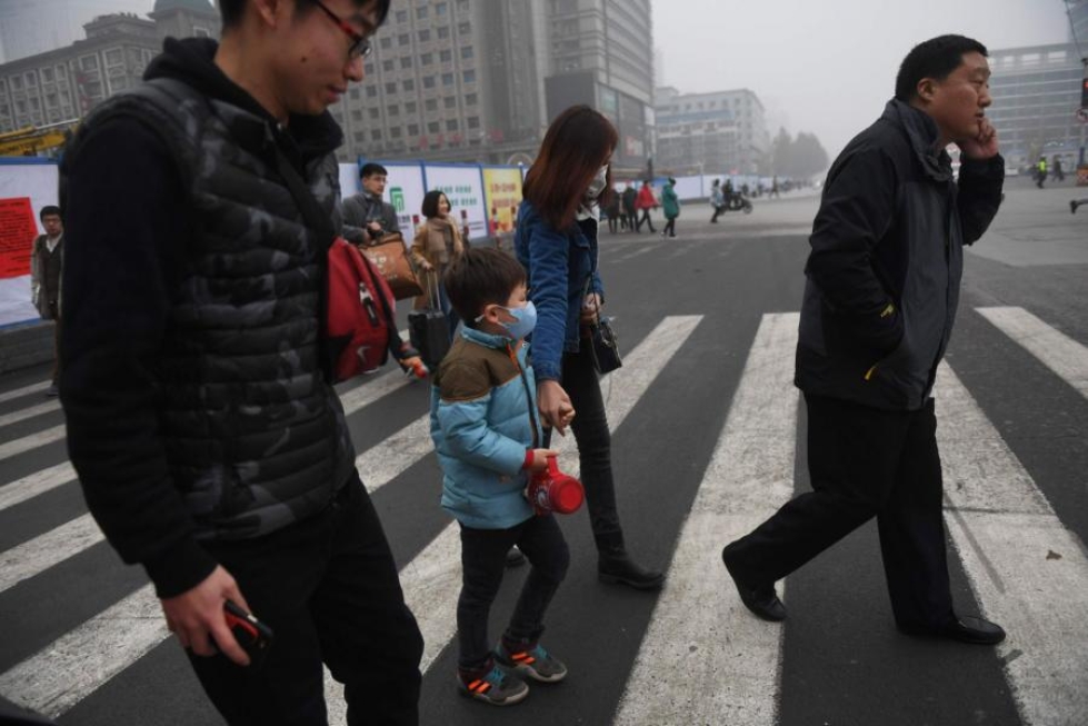 Ilmansaasteet ovat piinanneet Kiinan pohjoisosien asukkaita. Kuva: Lehtikuva/AFP