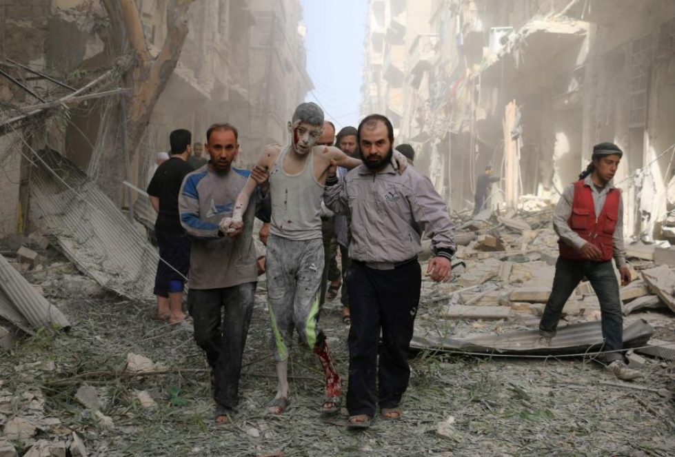 Syyrian ilmavoimien iskuissa on viime päivinä kuollut kymmeniä ihmisiä Aleppossa, kertovat paikalliset asukkaat. LEHTIKUVA/AFP