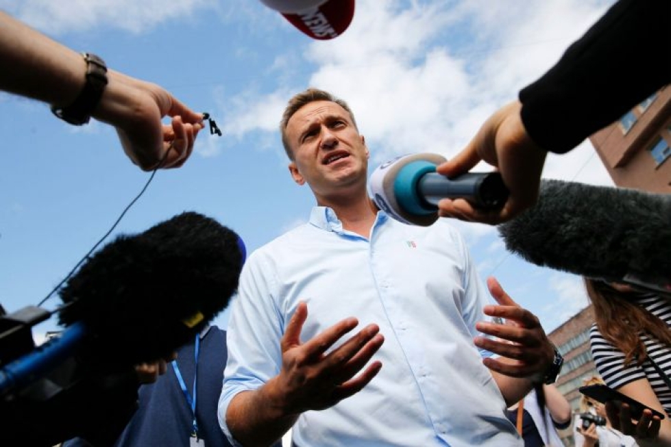 Aleksei Navalnyi puhui lehdistölle 20. heinäkuuta viranomaisten kieltämiä vaaliehdokkaita tukevassa mielenosoituksessa. LEHTIKUVA / AFP